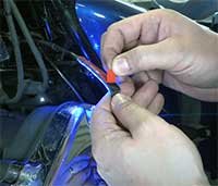 Remove the 3M paper backing from the LED lights