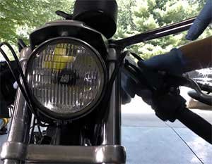Remove the nuts that fasten fork tube in place