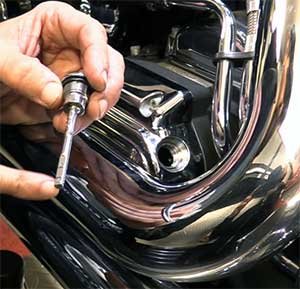 remove the dipstick for the second time to read it