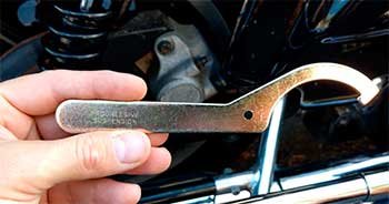 Rear suspension high adjustment tool